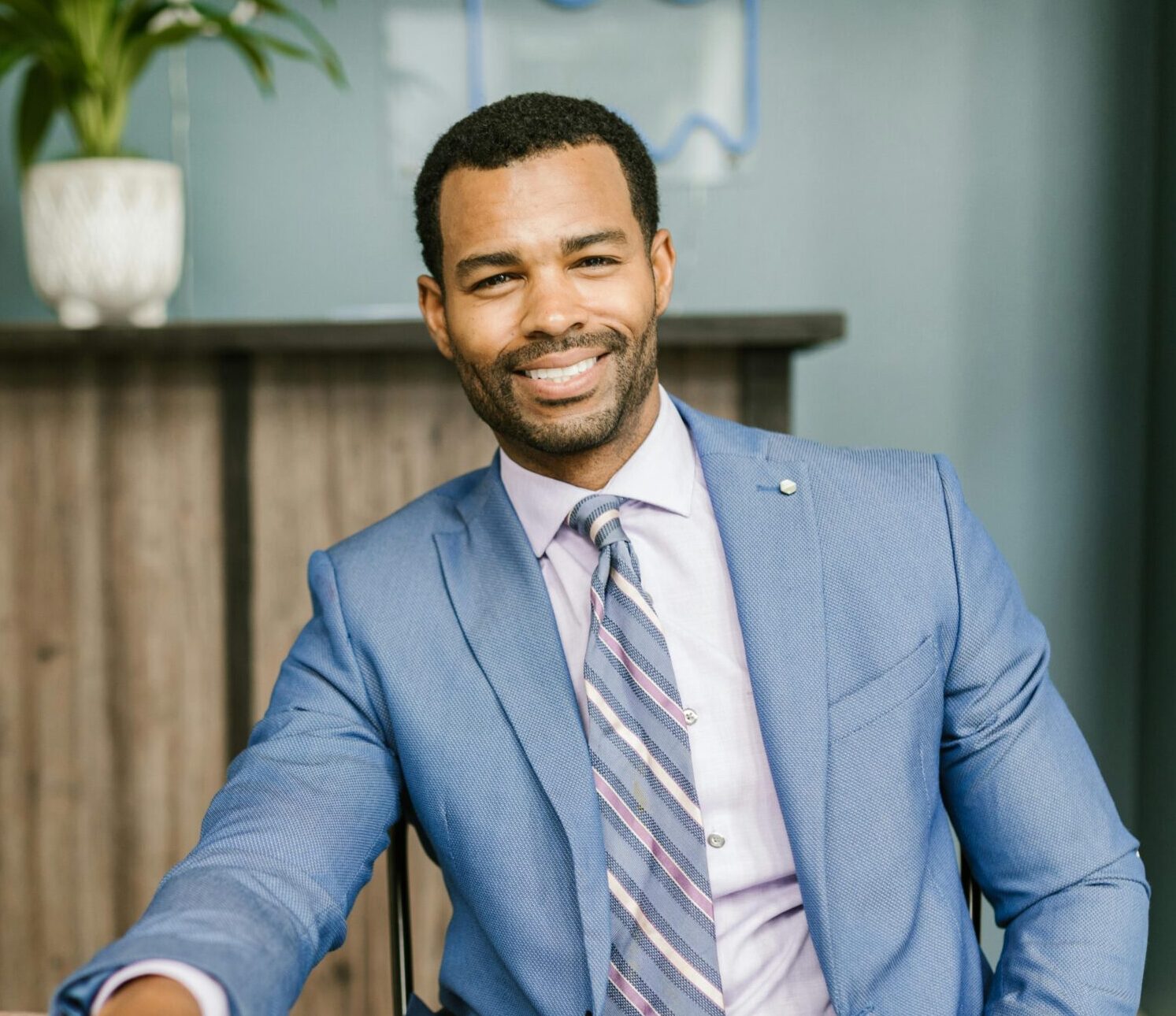 Friendly mediator in office, wearing suit