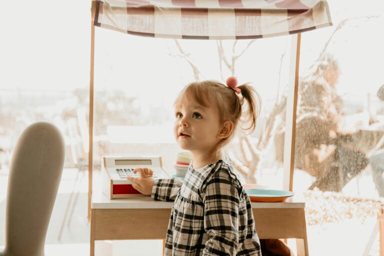 girl playing, protecting kids during divorce research